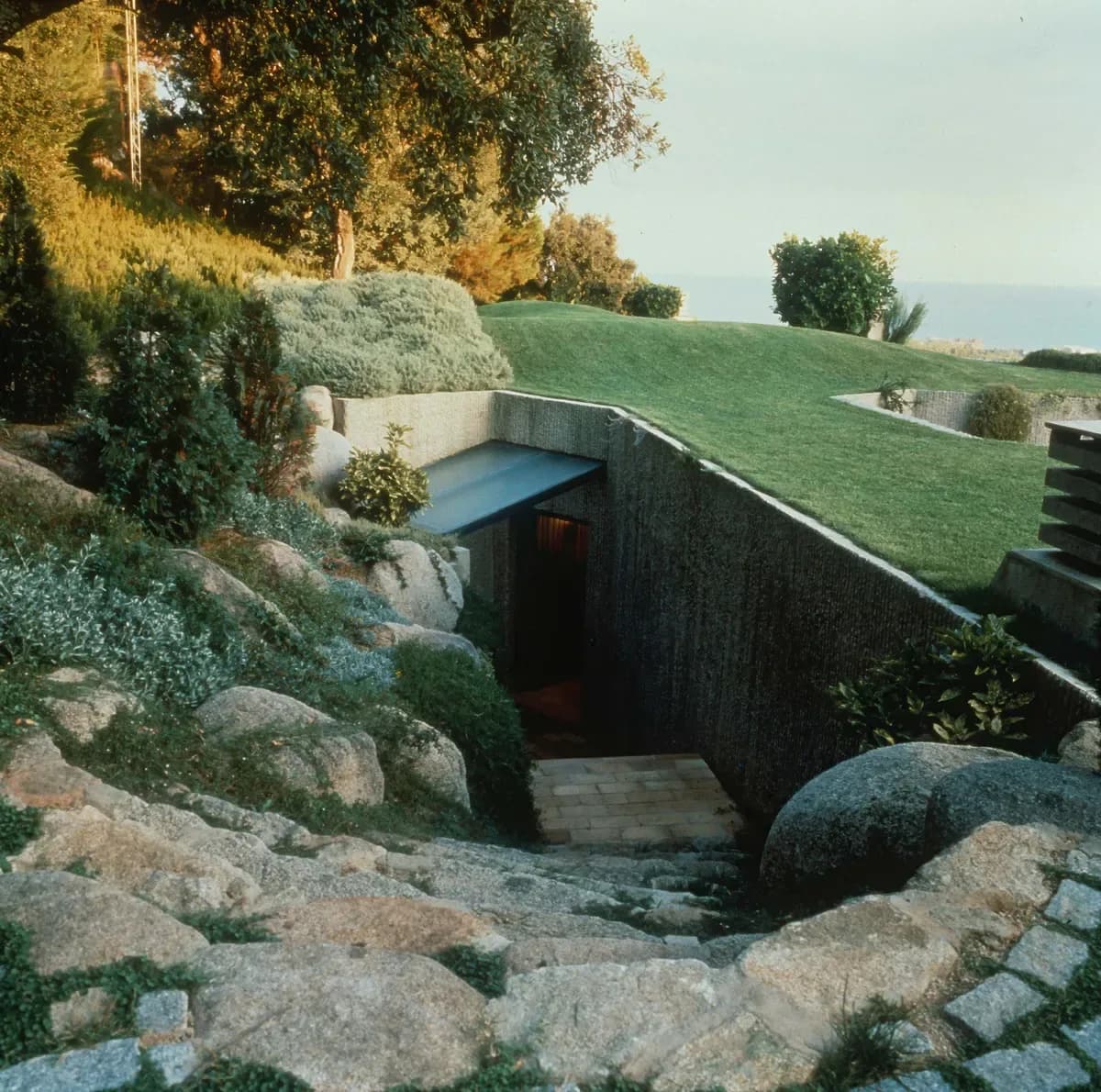 Earth-sheltered house